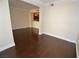 Hardwood floor living room with kitchen and dining views at 270 E Flamingo Rd # 107, Las Vegas, NV 89169