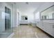 Large bathroom with dual vanities, walk-in shower, and soaking tub at 510 Duvet Ct, Henderson, NV 89012