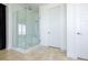 Modern bathroom design with glass-enclosed shower and neutral tiling at 510 Duvet Ct, Henderson, NV 89012
