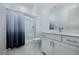 Bathroom with modern vanity, shower with glass door, and sleek fixtures at 510 Duvet Ct, Henderson, NV 89012