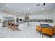 Spacious kitchen with stainless steel appliances, a large island, and a modern dining area at 510 Duvet Ct, Henderson, NV 89012
