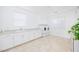 Well-organized laundry room with modern washer and dryer, ample counter space, and cabinet storage at 510 Duvet Ct, Henderson, NV 89012