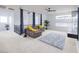 Comfortable living area with modern furnishings, neutral carpet, and contemporary design elements at 510 Duvet Ct, Henderson, NV 89012