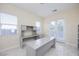 Bright home office featuring a large desk, natural light, and contemporary design at 510 Duvet Ct, Henderson, NV 89012