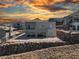 Contemporary two-story home featuring a private balcony, desert landscaping and mountain views at 510 Duvet Ct, Henderson, NV 89012
