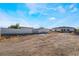 Wide shot of the expansive backyard featuring a block wall at 1430 Red Rock Dr, Pahrump, NV 89048
