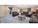 Open-concept living room with comfortable seating and plenty of natural light at 1430 Red Rock Dr, Pahrump, NV 89048