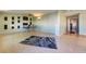 Open living room boasts hardwood floors, modern decor, and abundant natural light at 1430 Red Rock Dr, Pahrump, NV 89048