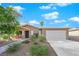 Charming single-story home with a two-car garage and well-maintained landscaping at 4657 Warner Pl, Las Vegas, NV 89115