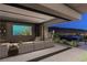 Open-concept living room with a bar, access to the backyard, and incredible city views at 607 Alpine Summit Dr, Henderson, NV 89012