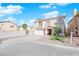 Beautiful two-story home with landscaped front yard, two-car garage, and great curb appeal at 10568 Salmon Leap St, Las Vegas, NV 89183