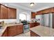 Cozy kitchen with stainless appliances, granite countertops, and ample cabinet space at 10568 Salmon Leap St, Las Vegas, NV 89183