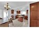 Spacious kitchen featuring wooden cabinetry, tile floor, and a central island at 10568 Salmon Leap St, Las Vegas, NV 89183