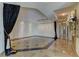 Bright foyer with elegant tile flooring and high ceilings at 9101 Alta Dr # 902, Las Vegas, NV 89145