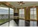 Living room with dark hardwood floors and city views at 9101 Alta Dr # 902, Las Vegas, NV 89145