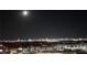 Stunning nighttime view of the city skyline at 9101 Alta Dr # 902, Las Vegas, NV 89145