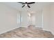 Bright bedroom features closet and a ceiling fan at 10315 Premia Pl, Las Vegas, NV 89135