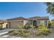 Charming single-story home with manicured landscaping and a two-car garage at 10315 Premia Pl, Las Vegas, NV 89135