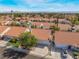 Aerial view of a neighborhood with houses and a mountain backdrop at 3120 Mediterranean Dr, Las Vegas, NV 89117