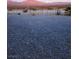 Gravel backyard with distant mountain views and desert landscape at 4780 Horizon Ave, Pahrump, NV 89060