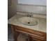 Close-up of the bathroom sink featuring a dated countertop and fixture at 4780 Horizon Ave, Pahrump, NV 89060