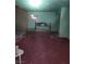 Bedroom with a disassembled bed frame and red carpeting needing renovations at 4780 Horizon Ave, Pahrump, NV 89060