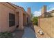 Inviting front entrance with a decorative walkway, desert landscaping, and a warm, welcoming vibe at 1214 Country Club Dr, Laughlin, NV 89029