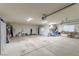 Large, well-lit garage offering abundant space for storage and various recreational activities at 1214 Country Club Dr, Laughlin, NV 89029
