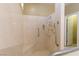 Step-in shower with built in seat and shelving at 1214 Country Club Dr, Laughlin, NV 89029