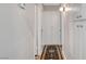 Hallway with neutral walls, patterned rug, and built-in storage cabinets with ample space at 2213 W Oakey Blvd, Las Vegas, NV 89102