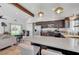 Bright kitchen features modern appliances and a breakfast bar that opens to the living area at 2213 W Oakey Blvd, Las Vegas, NV 89102