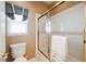 Bathroom with shower/tub combo and window at 2424 Ping Dr, Henderson, NV 89074