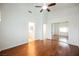 Spacious bedroom featuring hardwood floors and mirrored closet at 2424 Ping Dr, Henderson, NV 89074