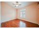 Bright bedroom with hardwood floors and ceiling fan at 2424 Ping Dr, Henderson, NV 89074