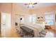 Virtually staged bedroom with wood floors and mirrored closet doors at 2424 Ping Dr, Henderson, NV 89074