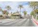 Gated community entrance with guardhouse at 2424 Ping Dr, Henderson, NV 89074