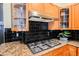 Gas cooktop and granite countertops in this updated kitchen at 2424 Ping Dr, Henderson, NV 89074