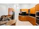 Modern kitchen with granite countertops and ample cabinet space at 2424 Ping Dr, Henderson, NV 89074