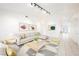 Virtually staged living room with light walls and tile floors at 2424 Ping Dr, Henderson, NV 89074