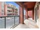 Private balcony overlooks the parking lot and surrounding buildings at 31 E Agate Ave # 205, Las Vegas, NV 89123