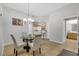 Bright dining area with glass table and four chairs at 31 E Agate Ave # 205, Las Vegas, NV 89123