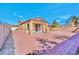 Expansive brick paved backyard featuring a covered patio area at 3665 Bella Legato Ave, North Las Vegas, NV 89081