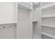 Walk-in closet with custom organizers offering ample shelving and hanging space at 3665 Bella Legato Ave, North Las Vegas, NV 89081