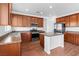 Well-equipped kitchen features stainless steel appliances, island, and ample cabinet space for storage at 3665 Bella Legato Ave, North Las Vegas, NV 89081