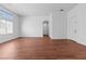 Stylish living room featuring sleek hardwood floors, neutral paint, and a welcoming atmosphere at 3665 Bella Legato Ave, North Las Vegas, NV 89081