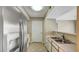 Efficient kitchen features stainless steel appliances and light countertops at 2300 E Silverado Ranch Blvd # 1094, Las Vegas, NV 89183