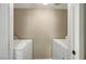 Well-lit laundry room with side-by-side washer and dryer at 2300 E Silverado Ranch Blvd # 1094, Las Vegas, NV 89183