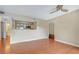 Bright living room with hardwood floors and kitchen pass-through at 2300 E Silverado Ranch Blvd # 1094, Las Vegas, NV 89183