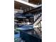 Modern home with striking outdoor architectural details and water feature, with desert-style landscaping at 685 Dragon Peak Dr, Henderson, NV 89012