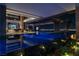 Luxurious infinity pool with city views and a modern architectural design at 685 Dragon Peak Dr, Henderson, NV 89012